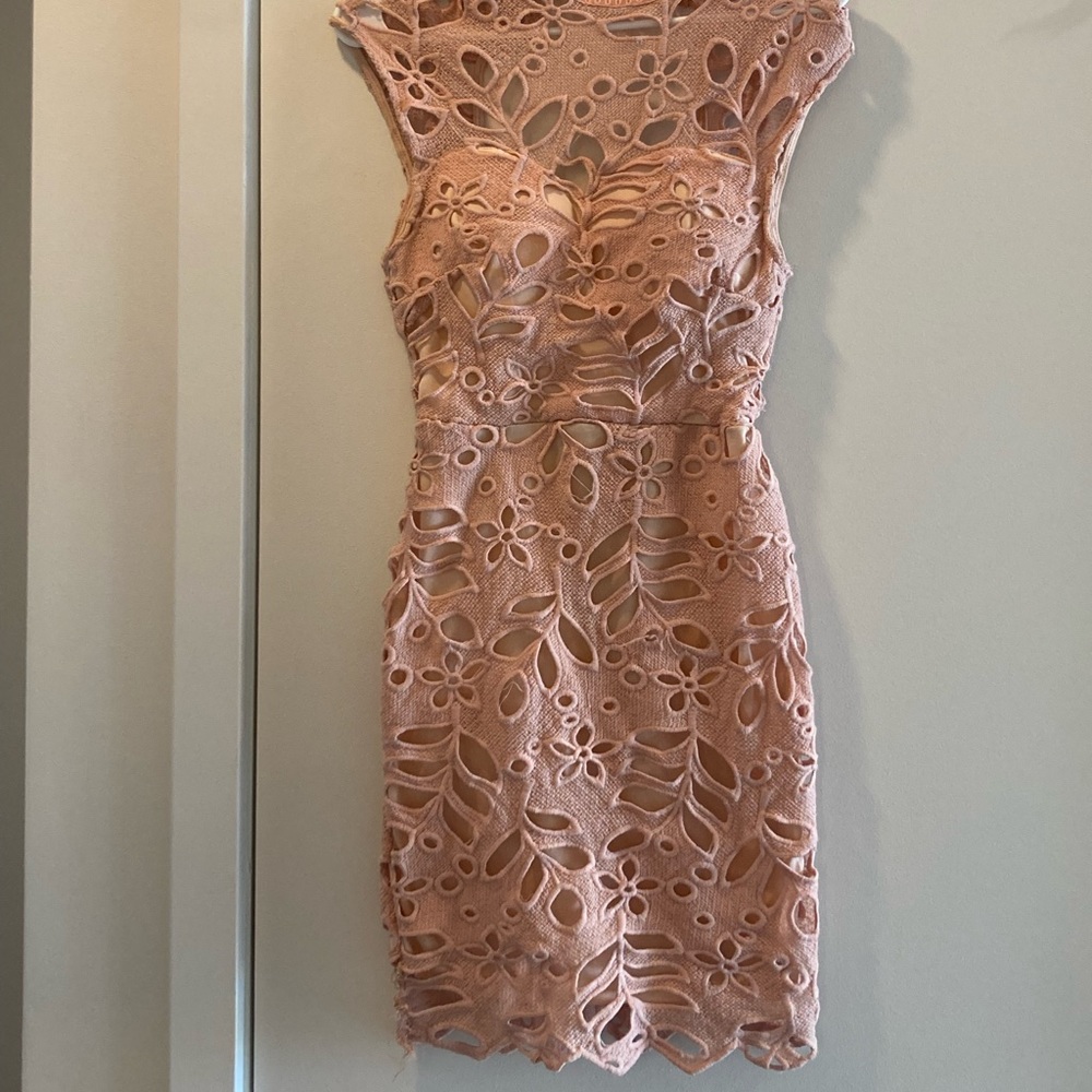 Fits like a size 2. Lovely on! Form fitting.